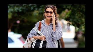 Katie Holmes runs errands in New York City in baggy top and jeans while having animated conversation [upl. by Olmstead]