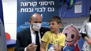 Israeli PMs 9yearold son gets COVID19 vaccine [upl. by Adnohr]