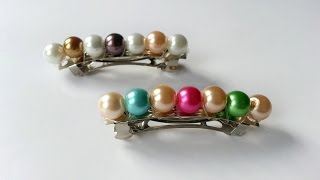 Create Pretty Beaded Hair Clips  DIY Style  Guidecentral [upl. by Leorsiy]