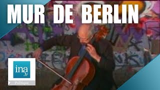 1989  Mstislav Rostropovich joue devant le Mur de Berlin  Archive INA [upl. by Enirrok]