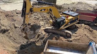 Caterpillar 385C Excavator Loading Mercedes amp Man Trucks  Interkat SA [upl. by Knowlton152]