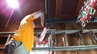 Fixing a Tilted Garage Door [upl. by Jeffrey]