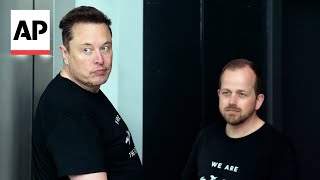 Elon Musk visits Tesla plant near Berlin after suspected arson attack [upl. by Mailand]