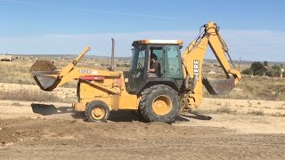 Moving a massive amount of dirt with a John Deere 310e Backhoe [upl. by Delija420]