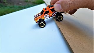 Hot Wheels cars slide down the board [upl. by Maltz]