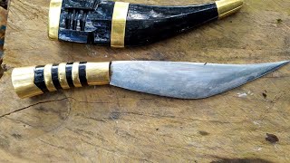 The process of making a handmade knife from buffalo horn and bullet casing [upl. by Bellew]