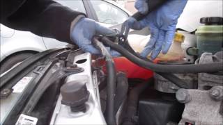 How to change coolant expansion tank on Ford Focus 2002 [upl. by Riordan]