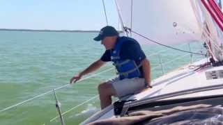 Offshore Sailing School  Adjusting the Fairlead on the Loaded Jib Sheet [upl. by Potter925]