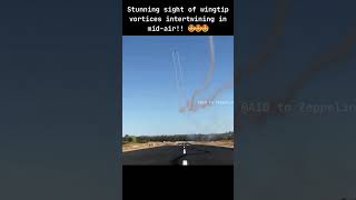 Stunning sight of wingtip vortices intertwining in midair 🤩🤩🤩 avgeek skies aviation shorts [upl. by Armbrecht346]