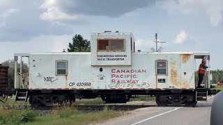 Canadian pacific caboose leads ballast train in beausejour  Manitoba [upl. by Fishman]