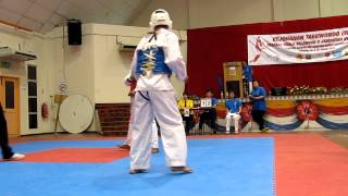 Taekwondo junior Sparring  White Belt Vs yellow belt round 1 [upl. by Valdes]