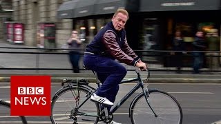 Arnold Schwarzenegger cycles wrong way down Edinburgh street  BBC News [upl. by Silloh]