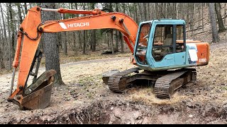 Excavator and driveway maintenance [upl. by Anilas761]