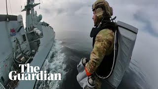 UK Royal Marines test flying jet suit between moving ships [upl. by Stannwood]