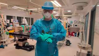 STERILE PPE Donning and Doffing Video for SURGICAL Aerosol Generating Procedures with PanSurgorg [upl. by Ahel]