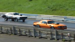 Dodge Charger vs Pontiac Trans Am Drag Race [upl. by Halil]