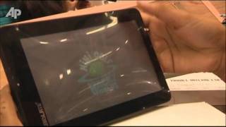 India Demos 35 Tablet Computer for Rural Poor [upl. by Restivo584]