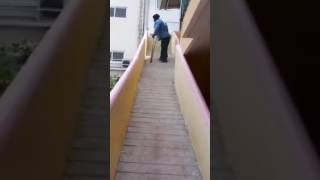 A disabled guy climbing ramp with the help of crutches [upl. by Okimuy929]