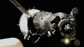 Soyuz spacecraft docks with ISS carrying USRussian crew [upl. by Haet]