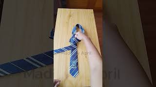 How to tie a tie on table  The quickest way to tie a necktie  Easy steps to tie a tie 10seconds [upl. by Bittner]