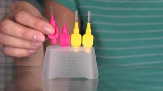 How to use a TePe Interdental Brush [upl. by Hareehahs525]