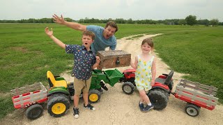 Using tractors to dig up treasure chest  Tractors for kids [upl. by Kcirderf]