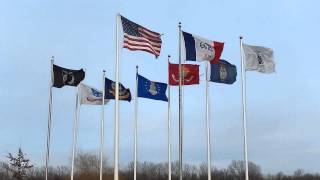 Flags blowing in the wind in Marengo [upl. by Mungovan]