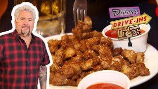 Guy Fieri Eats Chicken GIZZARDS in Michigan  Diners DriveIns and Dives  Food Network [upl. by Arramahs]