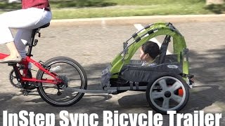 InStep Sync Bicycle Trailer Test Ride with a Folding Bike [upl. by Nemracledairam]