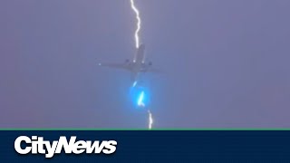 Video shows lightning striking plane shortly after taking off from YVR [upl. by Cullie]