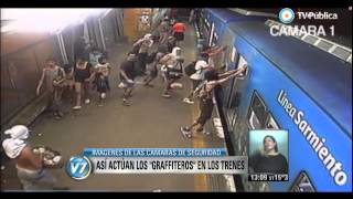 Visión 7  Imágenes sobre cómo actúan los quotgrafiterosquot en los trenes [upl. by Evelin]