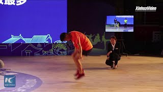 Chinese teenager breaks own record in jump rope contest [upl. by Stone]