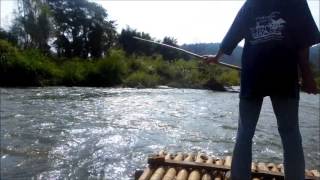 Rafting on a river near Chiang Mai Thailand [upl. by Ahsiekal]