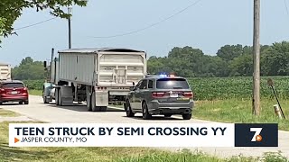 Teen stuck by semi crossing Route YY [upl. by Elladine629]