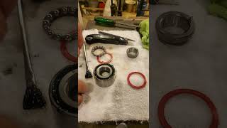 repacking ATV wheel bearings with waterproof grease [upl. by Reginnej587]