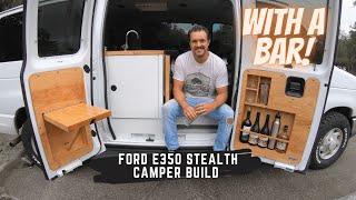 Ford E350 Econoline van stealth camper conversionwith a bar [upl. by Namruht11]