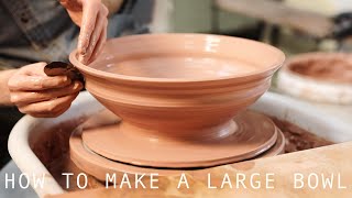 Throwing and Trimming a Large Indented Stoneware Bowl [upl. by Seaman627]