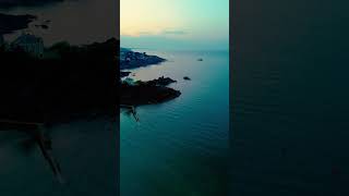 Coastal Rocks and Distant Manor  Stunning Drone Footage of Dramatic Seascapes coast drone sea [upl. by Tella529]