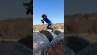 Jumping Hay Bales On The ranch shorts haybales farmfun farmboy parkour ranch [upl. by Nevur]