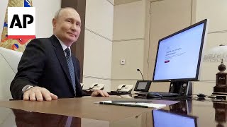 Video shows Putin purportedly voting online in Russian election [upl. by Nylikcaj938]