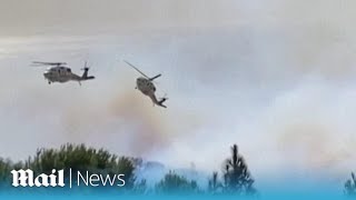 Moment choppers nearly collide fighting Malibu wildfire [upl. by Llig]