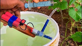 How to make mini water pump with mini DC motor a syringe [upl. by Hulburt]