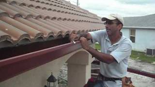 Seamless Gutters Installation Spikes or Hanger Tamarac FL [upl. by Anyehs]