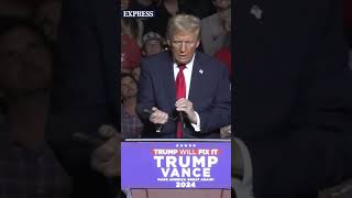 This mic STINKS Donald Trump rips mic from stand during rally [upl. by Marj]