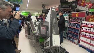 Black Friday shopping invades British stores [upl. by Kumler]