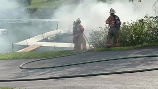 Video Firefighters battle boat fire at Owasco Marina [upl. by Aicelef]