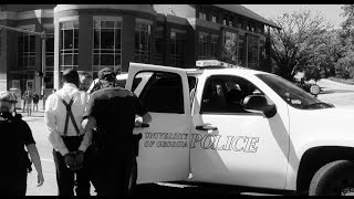 Prejudice white cops arrest unarmed black preacher at University [upl. by Hertberg]