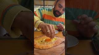 Teaching the perfect way to eat khachapuri georgia kazbegi stepantsminda europe russia food [upl. by Jerrylee]