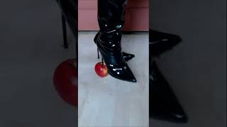 Thighhigh boots with a high heel step on an apple part 2 [upl. by Rivers]