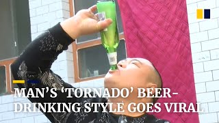 Chinese man’s ‘tornado’ beerdrinking style becomes online sensation [upl. by Clorinde370]